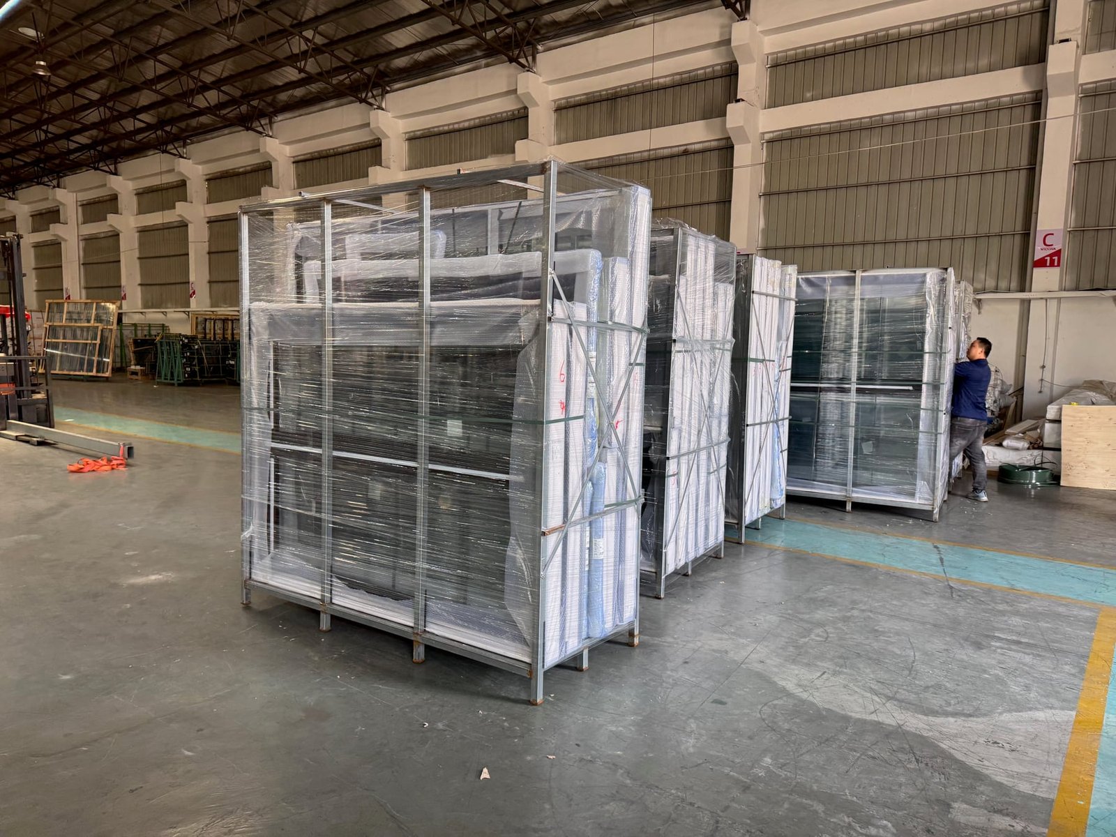 Window and door units protected in export racks before shipment