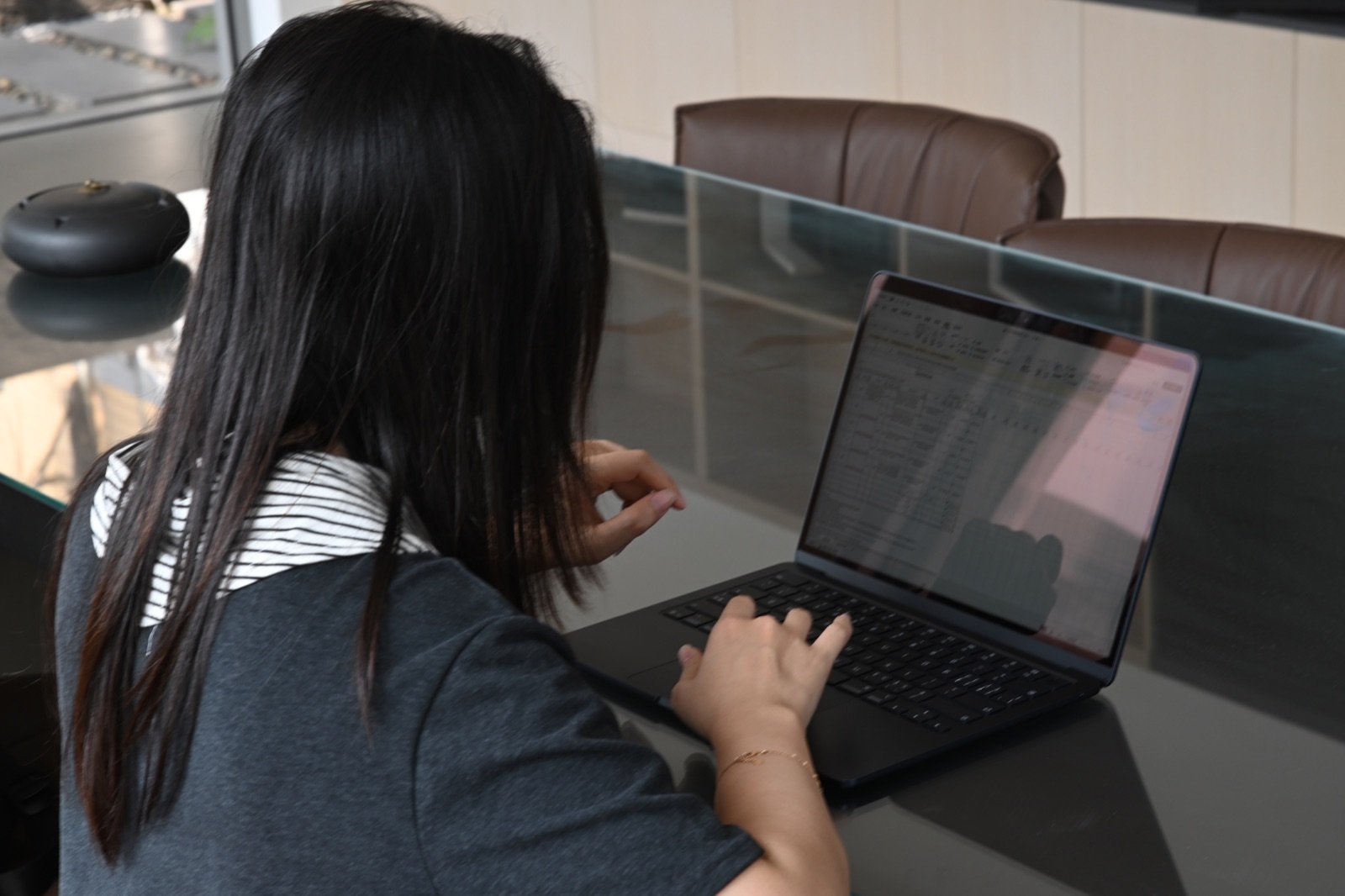 LUMI team member reviewing a window and door project schedule
